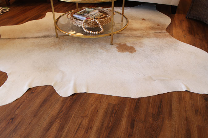 Wrinkles around the edge of my cowhide rug